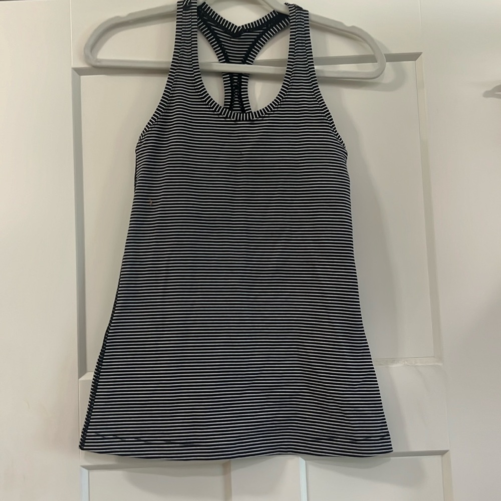 Lululemon black and white stripe tank size 6. Great condition.